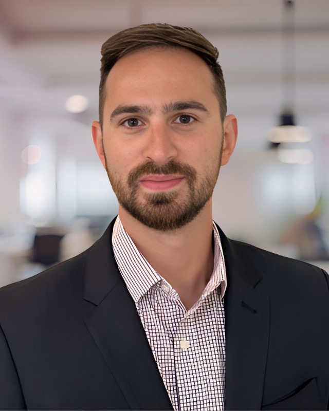 Photo of Jon Bozzuto, Head of Investor Relations, Rivel